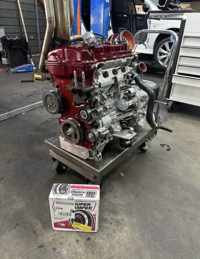 Mitsubishi Evo X powertrain with robust 2.0L 4B11T turbocharged engine and advanced Super All-Wheel Control (S-AWC) system, offering high-tuning potential, exceptional traction, and agile handling.