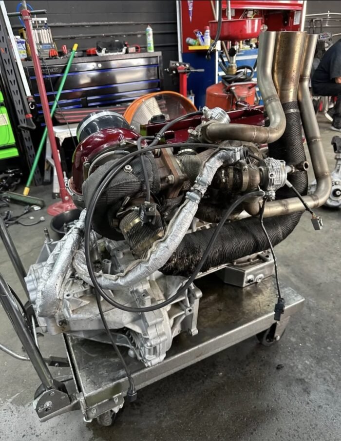 Mitsubishi Evo X powertrain with robust 2.0L 4B11T turbocharged engine and advanced Super All-Wheel Control (S-AWC) system, offering high-tuning potential, exceptional traction, and agile handling. - Image 4