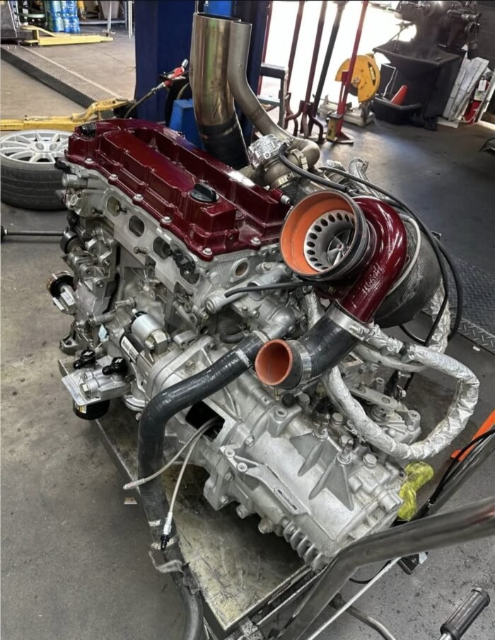 Mitsubishi Evo X powertrain with robust 2.0L 4B11T turbocharged engine and advanced Super All-Wheel Control (S-AWC) system, offering high-tuning potential, exceptional traction, and agile handling. - Image 7