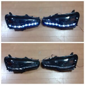 Spec-D Tuning R8 Style Projector Headlights with LED DRL Bar, specifically designed for Mitsubishi Lancer and EVO X models